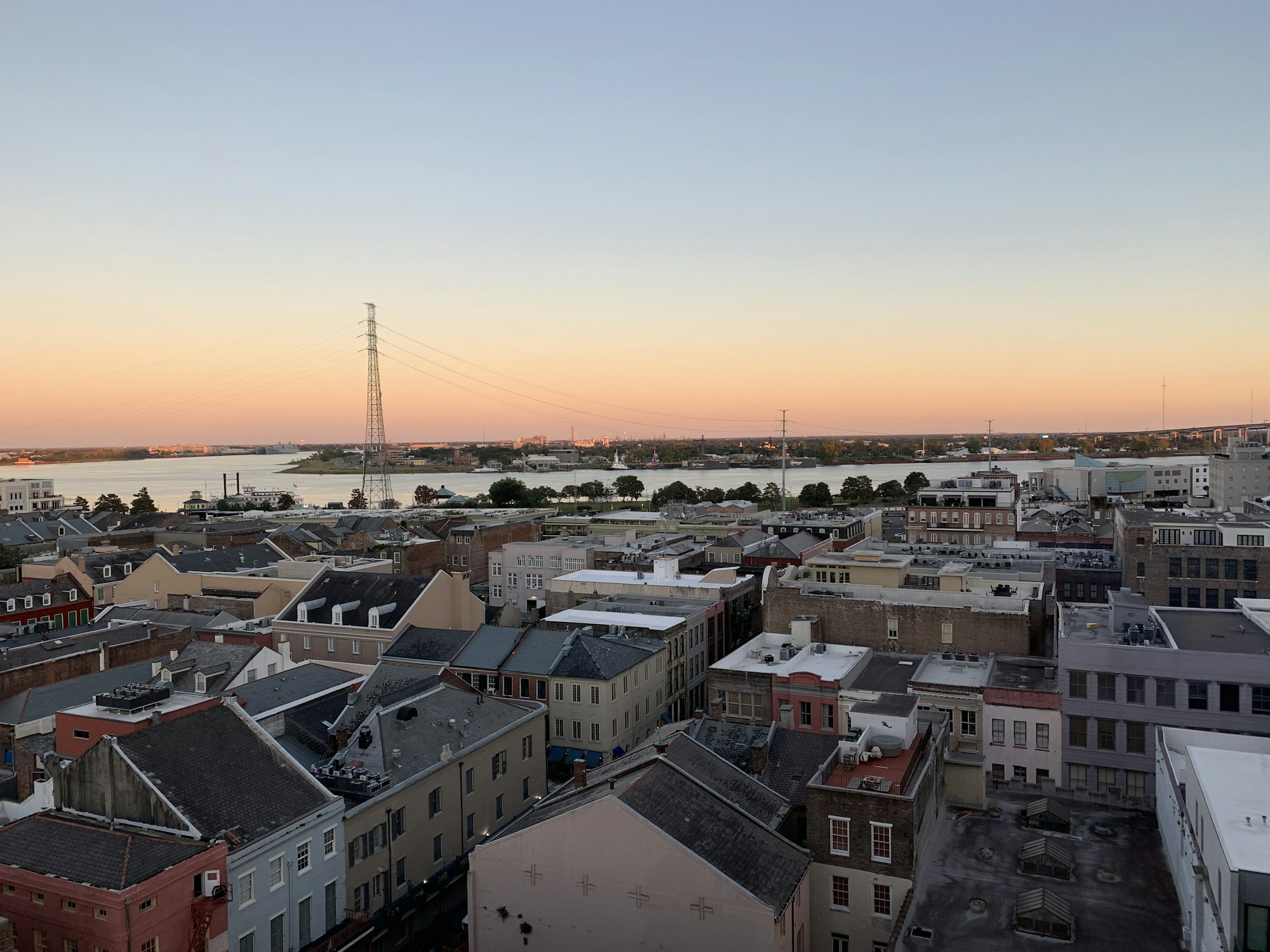 New Orleans skyline at dusk over the Mississippi River